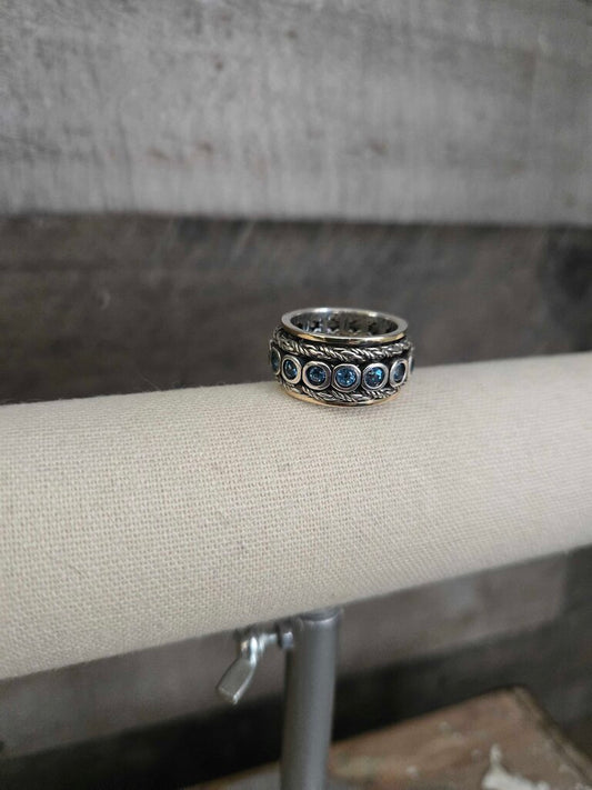 Sterling Silver and 14k Gold Blue Topaz Spinner Ring